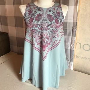 New dusty blue tunic tank with floral print.